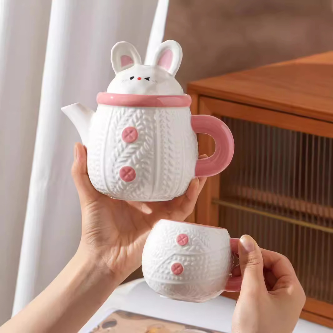 Creativo y lindo conejo hervidor de cerámica taza de agua doméstica de alto valor de cara con regalo de mano para niñas con un conjunto de tazas de agua