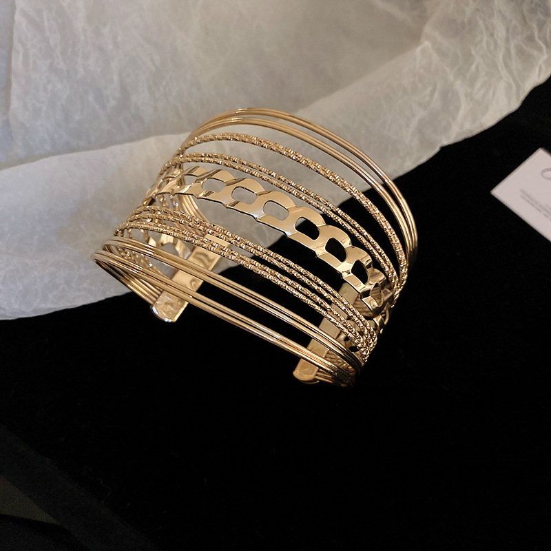 Europa y América plisada redonda abierta pulsera de metal estilo frío pulsera personalizada luz lujo alto sentido pulsera fábrica al por mayor