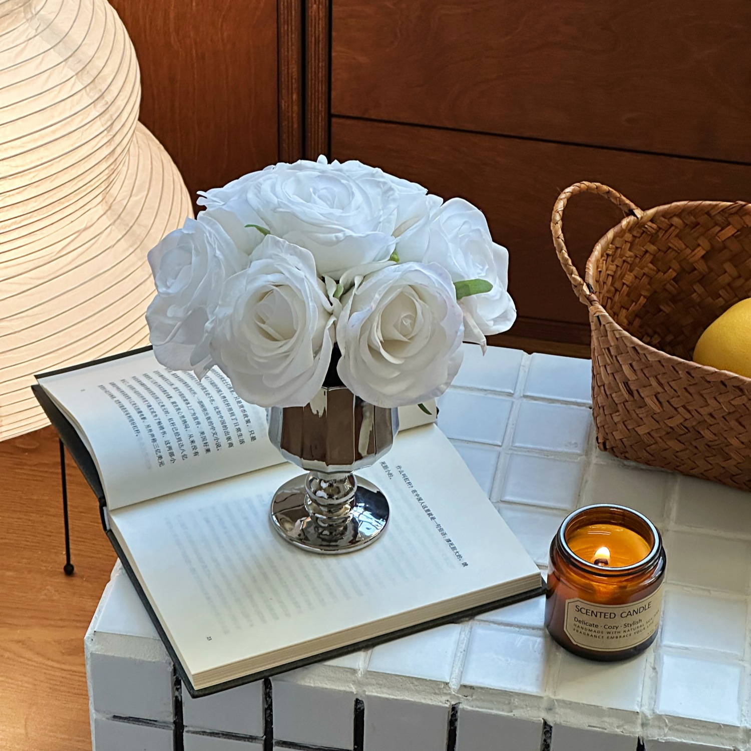 Pleated bottle + white hand holding