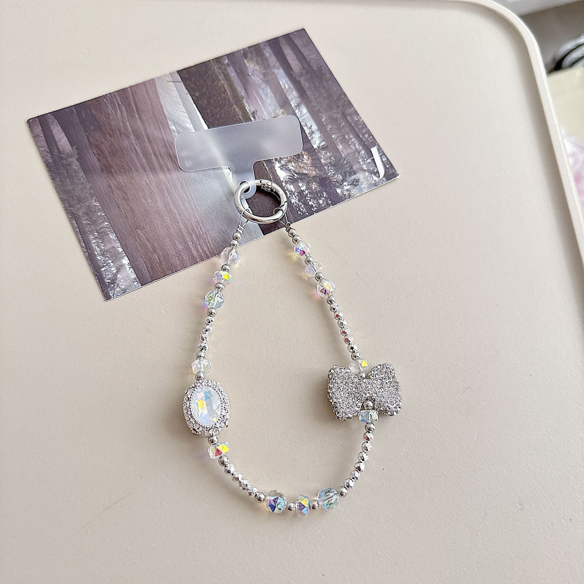 Boutique hecho a mano de alta gama teléfono móvil cadena colgante ins mujer ligero lujo dulce fresco estilo princesa moda teléfono móvil cadena colgante mensajero largo