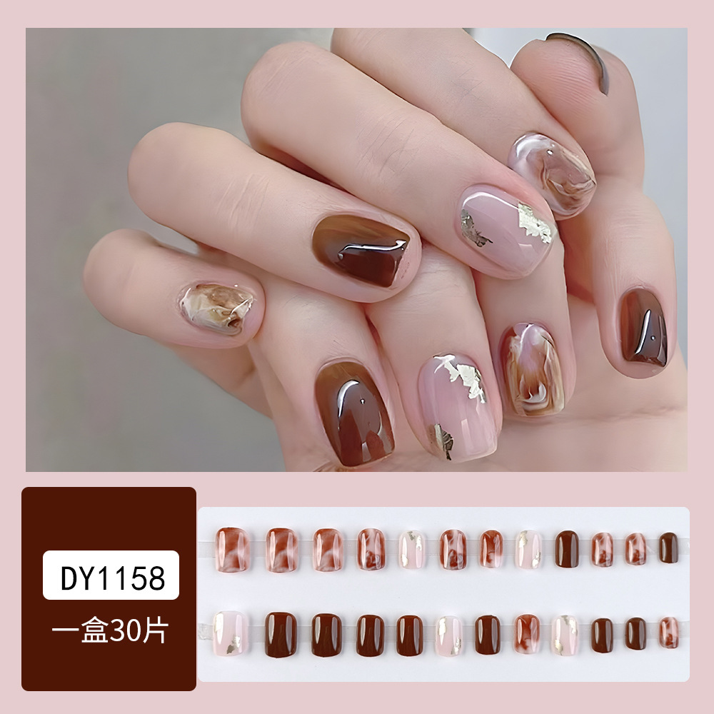 Uñas portátiles de tendencia en TikTok con una sensación de alta gama para el otoño, puro deseo, pegatinas de arte de uñas portátiles con ojo de gato y sonrisa rosa brillante.