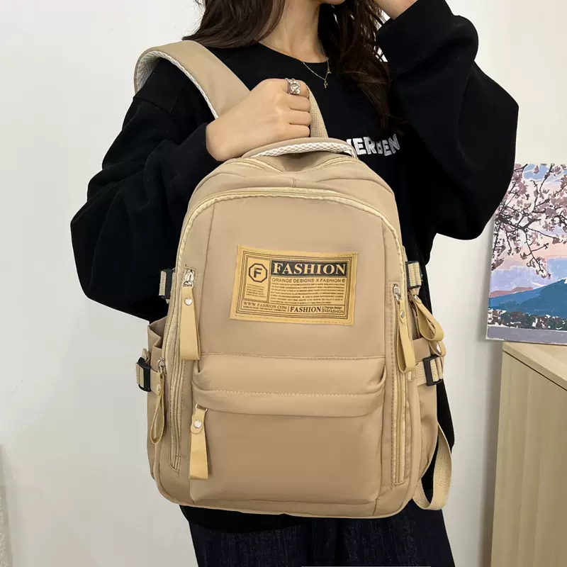 2025新款跨境书包女学生尼龙复古简约初高中生男大容量双肩背包
