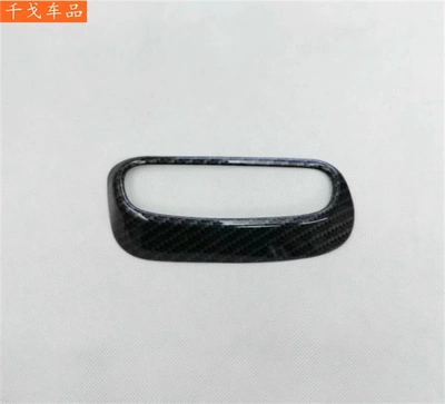 Suitable for Chevrolet Equinox, carbon Body sticker - headlight-adjustment-switch
