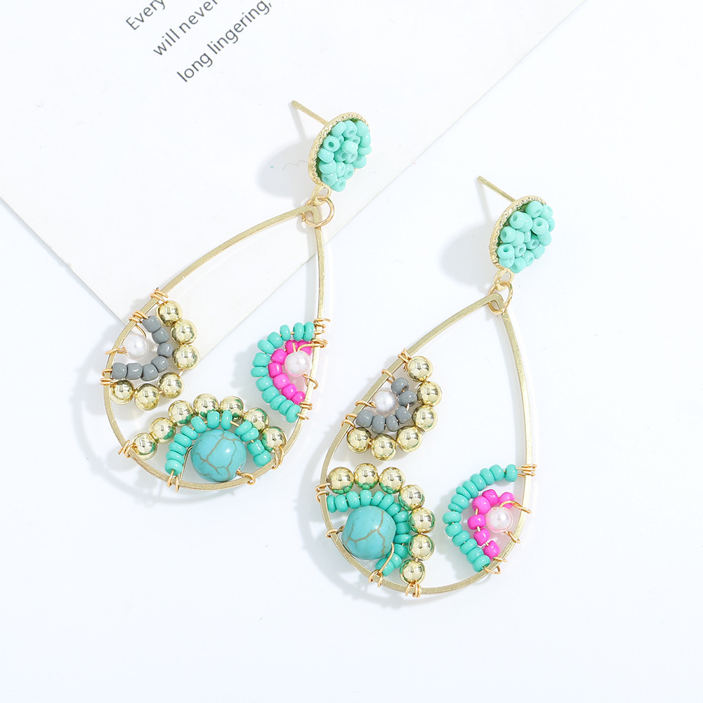 Fashion Water Drop Long Handmade Rice Bead Earrings display picture 6