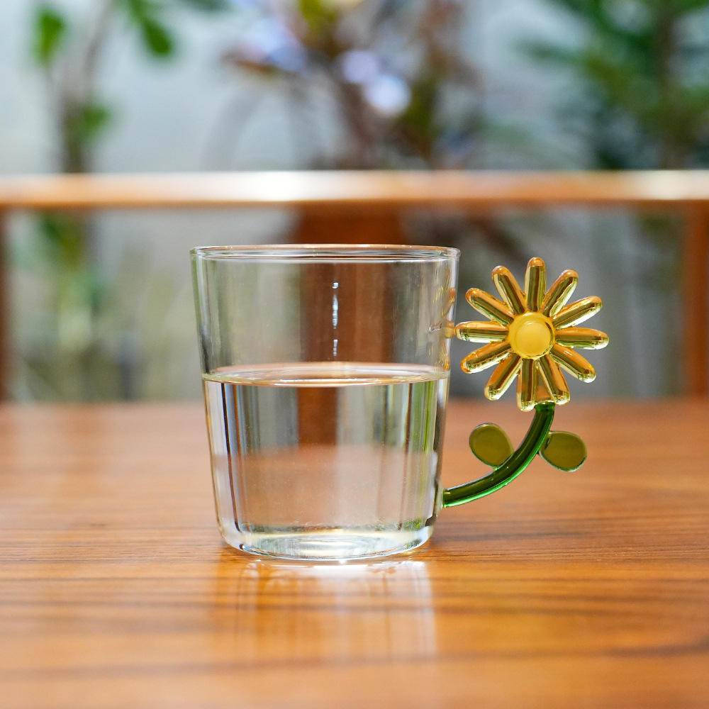 Taza de agua estereoscópica de flores solares con mango de taza de jugo de leche doméstica taza de café fábrica lote