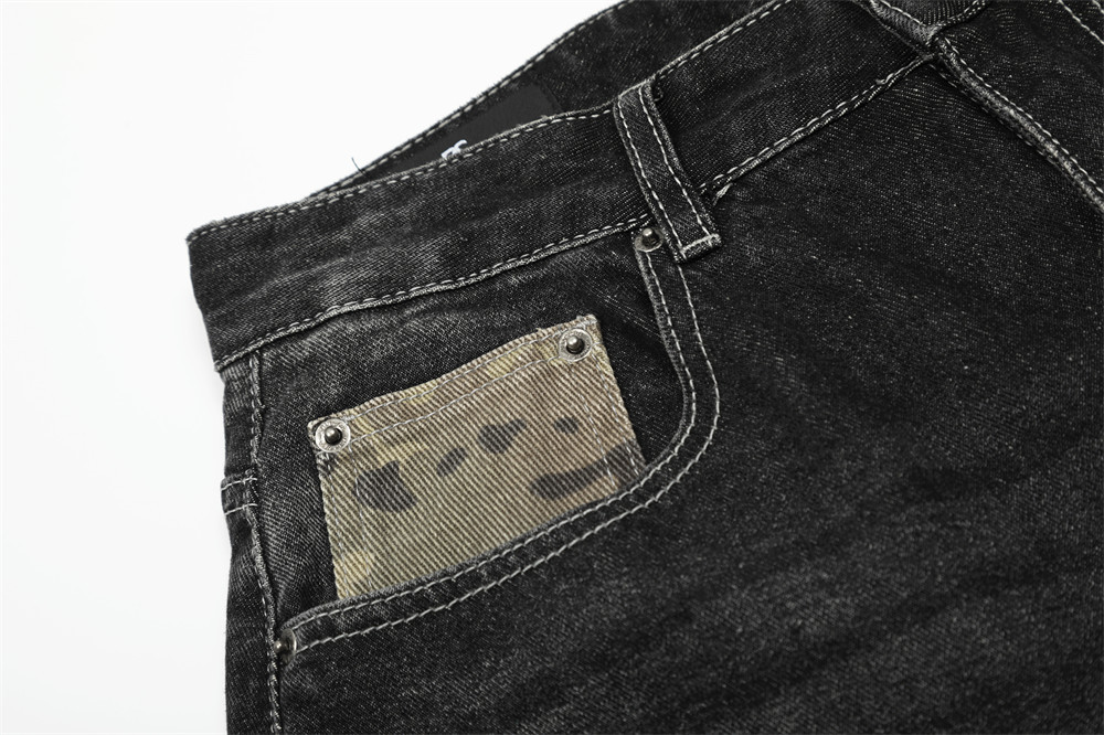 Pantaloncini di jeans camo patchwork da uomo effetto distressed_voghion.com