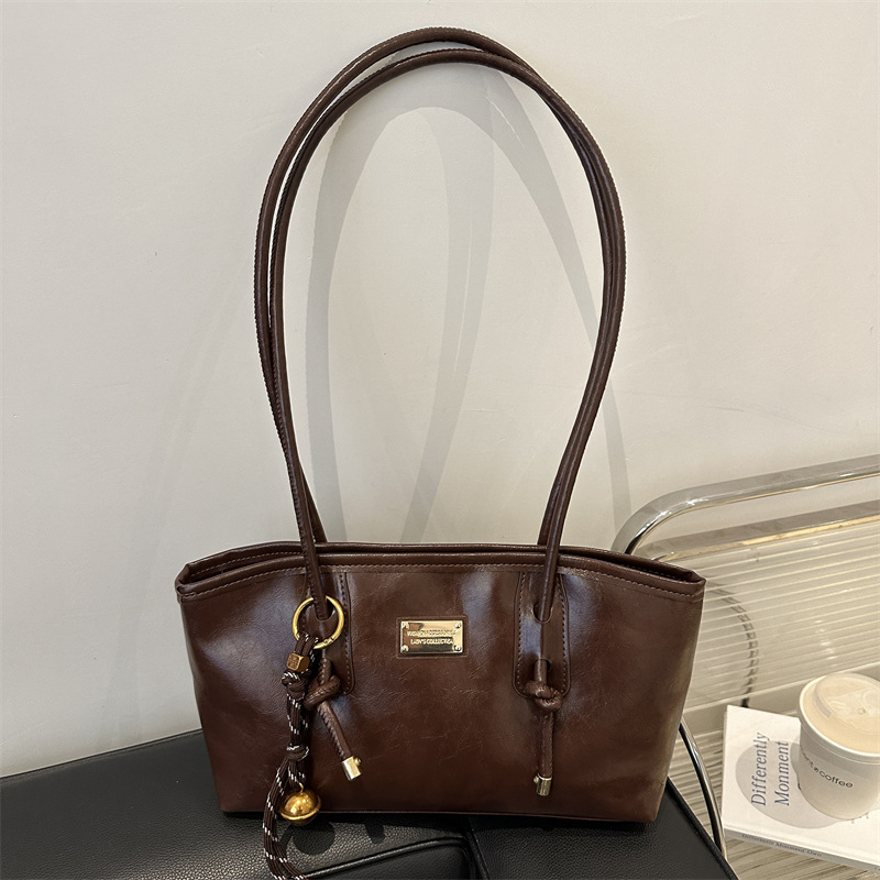 Alta sensación de viaje retro bolsas de gran capacidad para mujeres 2024 nuevo otoño invierno versátil bolsas de hombro de brazo bolsas especiales