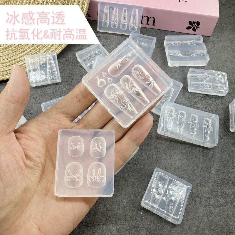 氷感の高い爪の金型のチューリップの漫画の蝶結びのシリコンの膜は爪のツールセットの工場の卸売りを備えます。|undefined