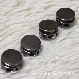 服装辅料批发市场枪黑色弹簧扣双孔猫眼扣 调节纽扣 吊钟厂家