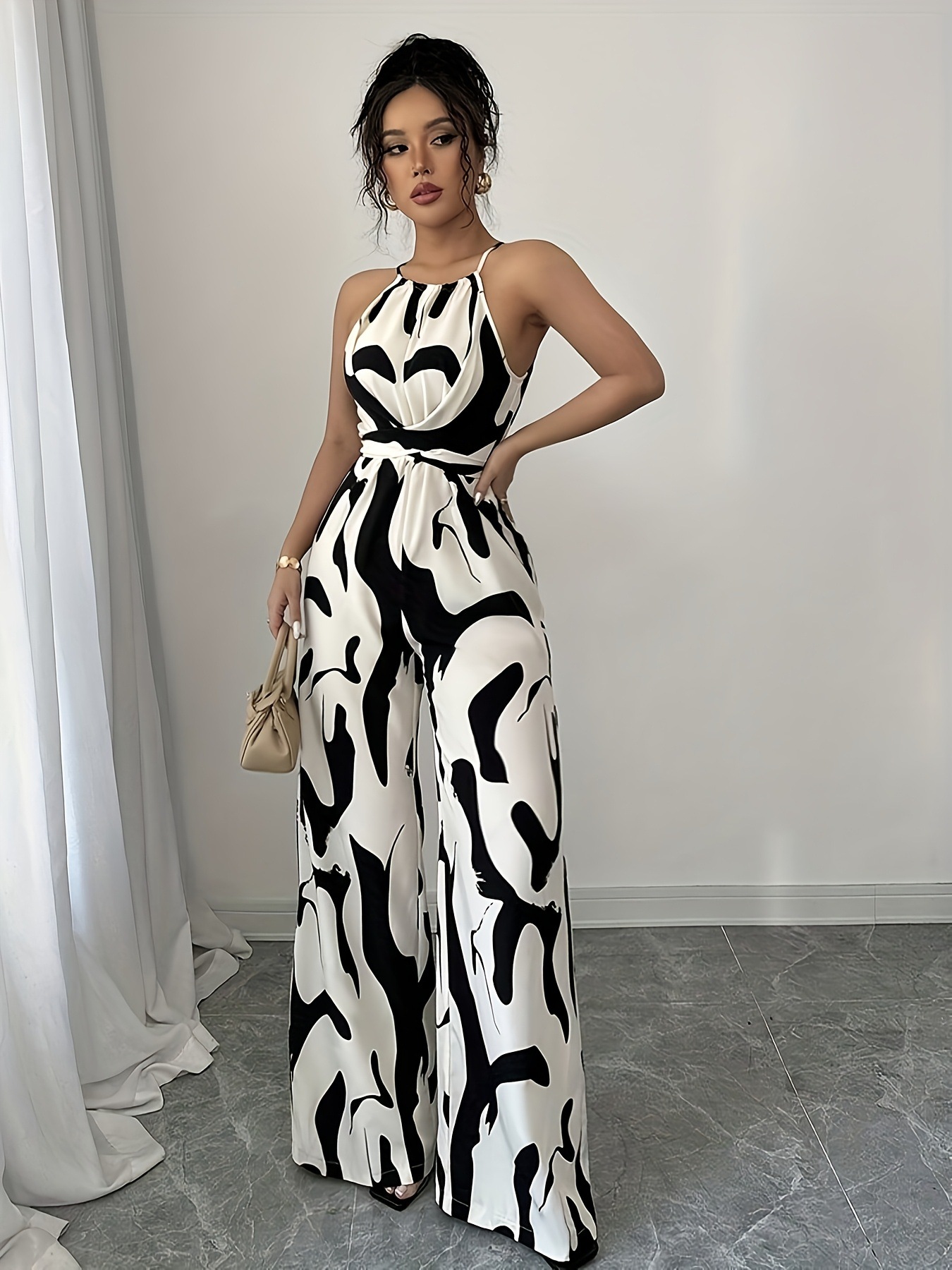 Damen Jumpsuit Mit Milch Muster Druck Halfter Ausschnitt Schwarz_voghion.com