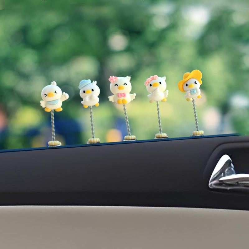 Clip de salida de aire de coche pequeño pato amarillo resina aromaterapia de coche perfume de coche adornos de dibujos animados accesorios de decoración suministros de coche