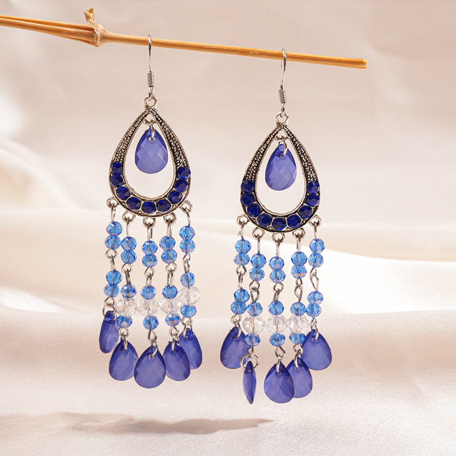 Europa y los Estados Unidos con diamantes de vidrio hueco en forma de gota de agua gancho de orejas bordado estilo nacional retro lujo ligero nicho de alta calidad pendientes para mujeres