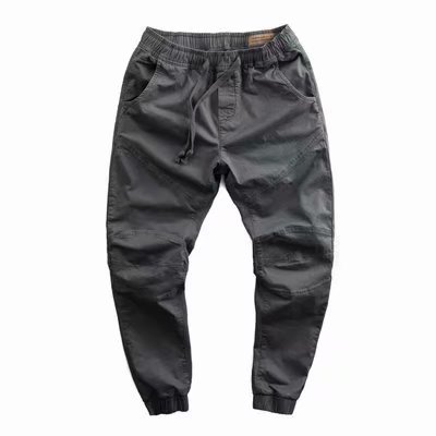 Estilo coreano de color sólido overoles marca de moda para hombres pantalones de protección laboral atados al tobillo primavera y otoño pantalones casuales sueltos para hombres entrega de una pieza