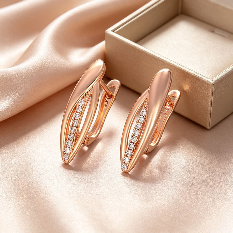 Pendientes de aro Xuping transfronterizos rusos de 18k con incrustaciones de diamantes, joyería de lujo ligero de alta gama al por mayor para mujer.