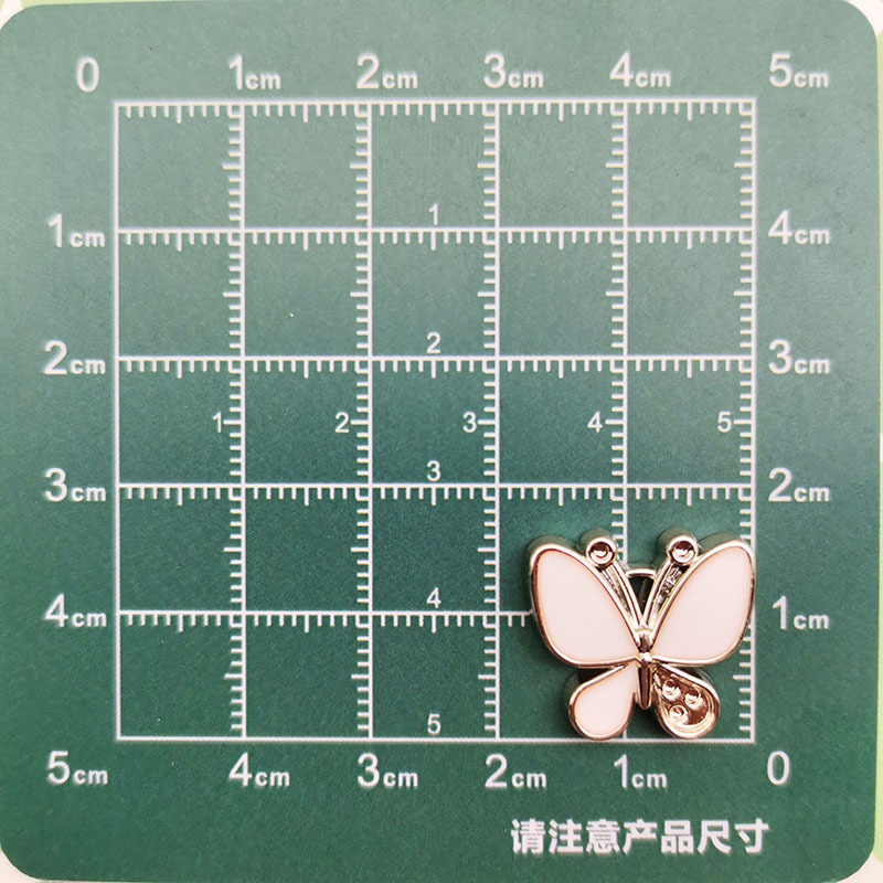 Temperamento de moda blanco y negro pequeño viento fragante cuatro hojas accesorios de plástico corazón de melocotón DIY pinzas de cabello material de ropa de correa