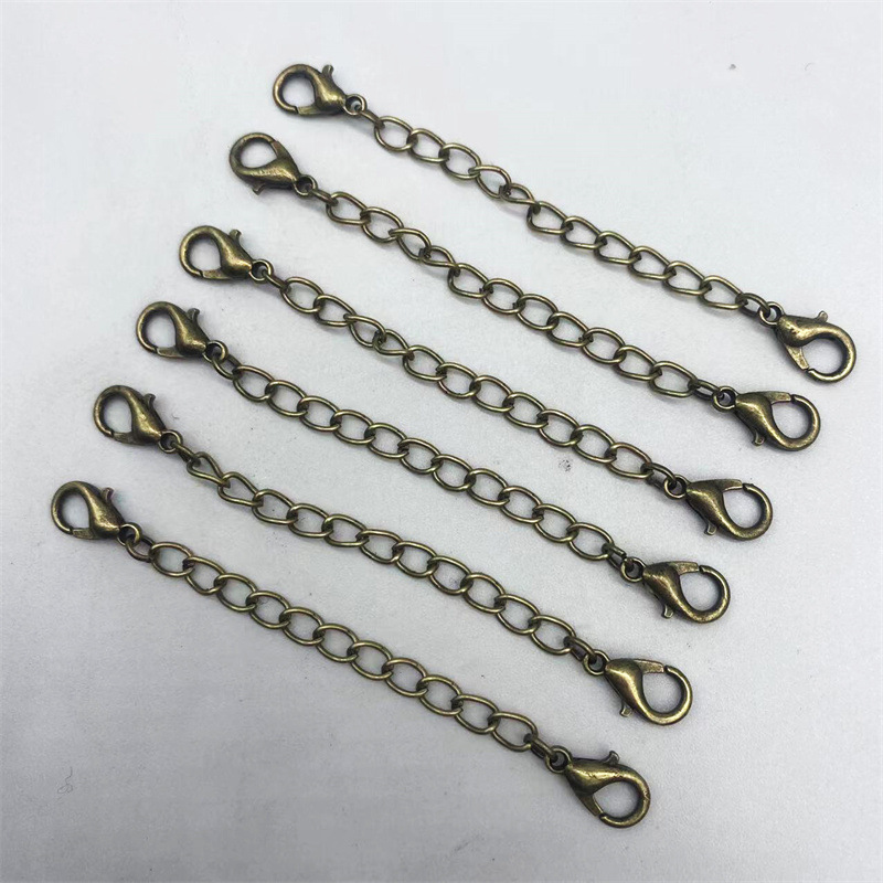 Hebilla de langosta de doble cabeza con cadena de cola cadena ajustable Cadena de extensión de cadena de cuerda de cuero material de joyería de bricolaje Cadena de todo partido al por mayor