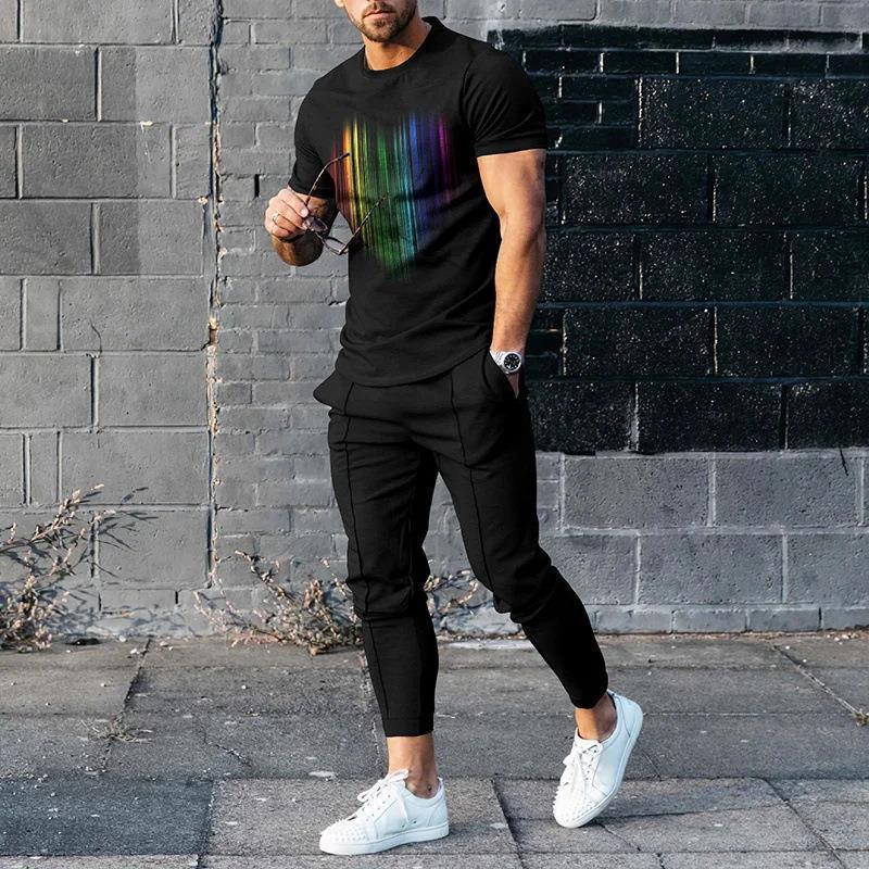 男性のスーツの夏の青年の半袖のtシャツのストライプは色のゆったりした弾力の薄い運動のズボンの2つのセットをつづり合わせます。|undefined