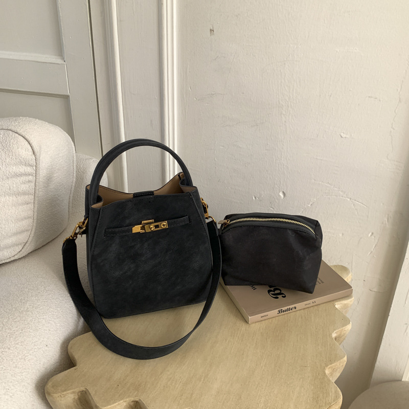 Super caliente canasta de platos de mano bolso de cubo de agua mujer venta caliente transfronteriza nuevo nicho coreano alto sentido versátil bolso mochila