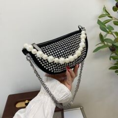 大衆がデザインした明るいドリルバッグ女性が流行しているファッション的なドリルバッグの高級感がある腋の下にチェーンを組み合わせたシングル肩のショルダーバッグ