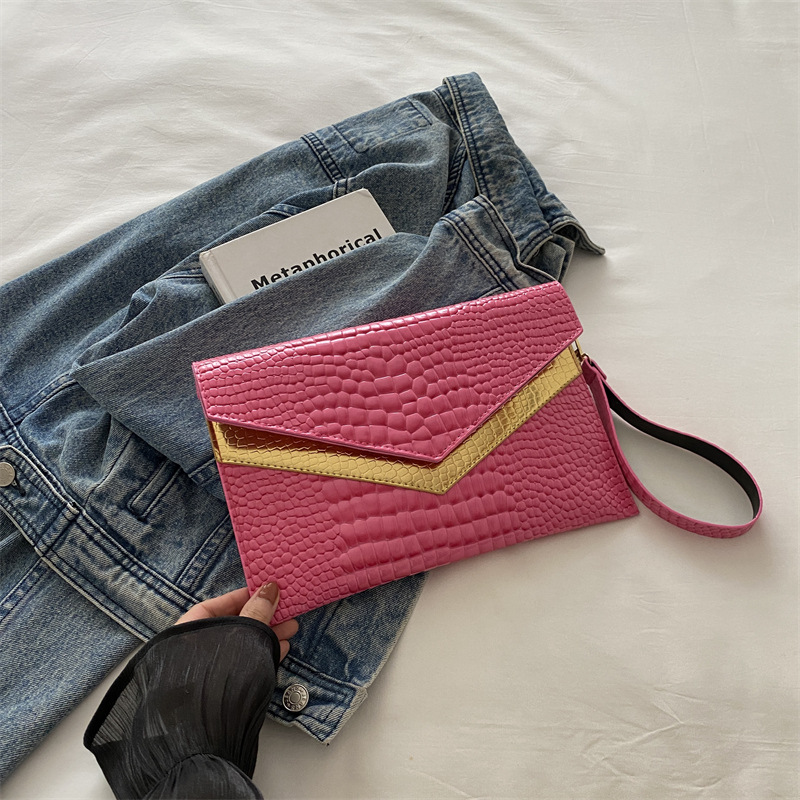 Bolso de mano sobre 2024 otoño nuevo estilo personalidad coreana moda femenina de moda temperamento casual todo-fósforo banquete pequeño bolso