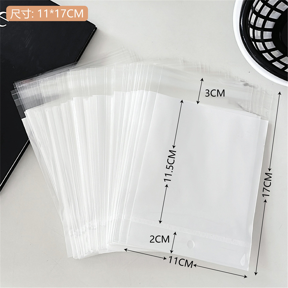 Colección de bolsas opp transparentes, cabeza de tarjeta, bolsa de embalaje trasera, bolsa de joyería pequeña, bolsa autoadhesiva con orificio colgante, bolsa de embalaje de plástico al por mayor