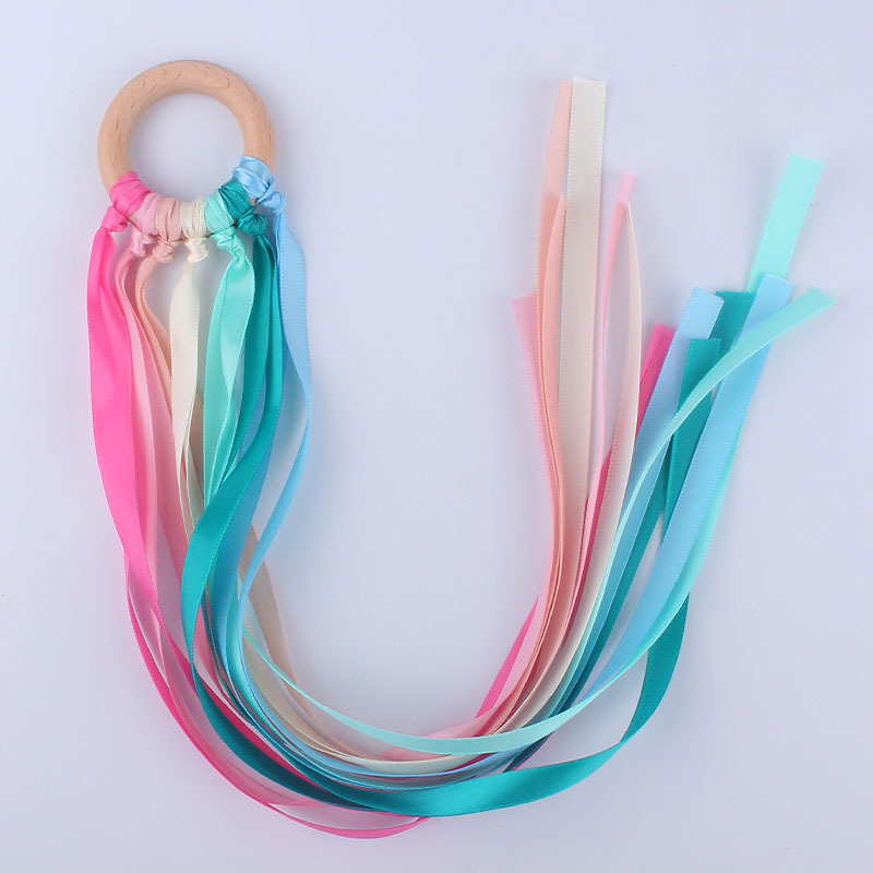 Nuevo bebé suministros cinta Beech sonajero calmante bebé creativo anillo de madera juguete dientes molienda Amazon
