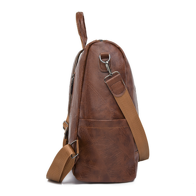 Comercio exterior al por mayor 2023 nueva mochila de cuero suave para mujer retro simple y versátil mochila de viaje multifuncional mochila escolar