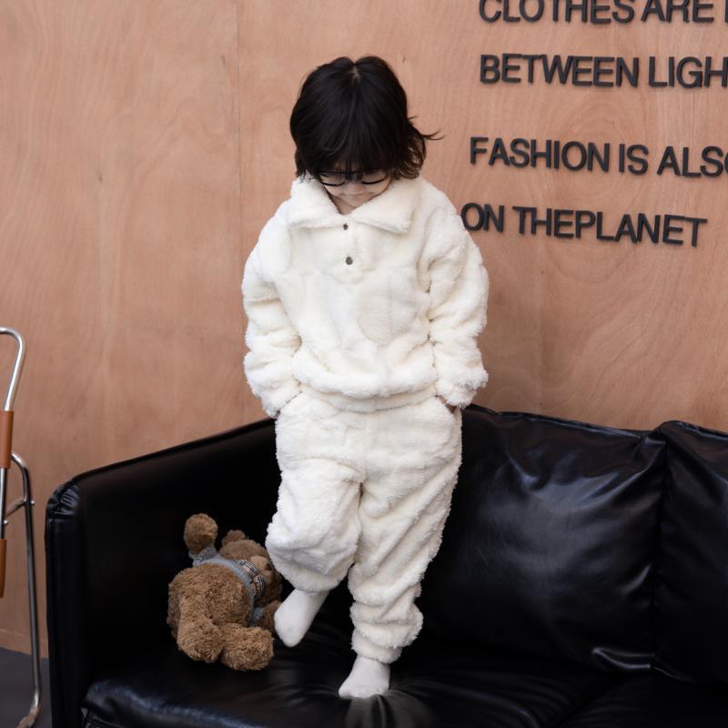 Ropa de casa para niños pijamas traje Otoño e Invierno terciopelo de algodón engrosado niños medianos y grandes niños cálidos y niñas solapa color sólido