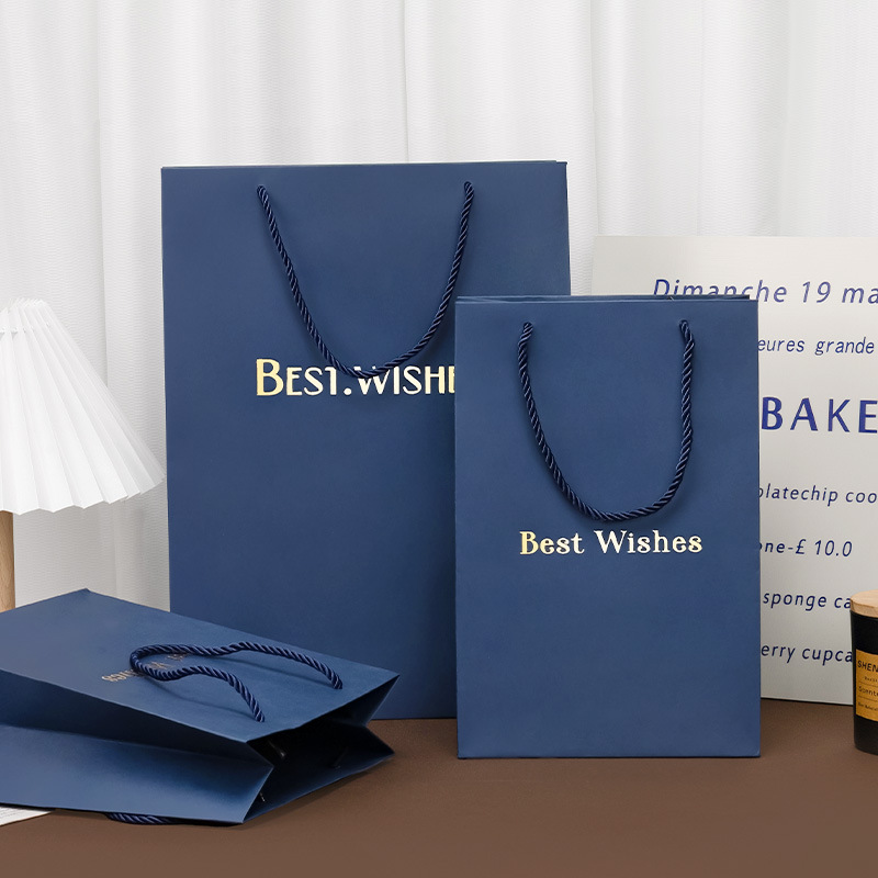 En stock bolsa de regalo azul bolsa de papel portátil exquisitas compras bolsa de embalaje grande bolsa de regalo cosmético