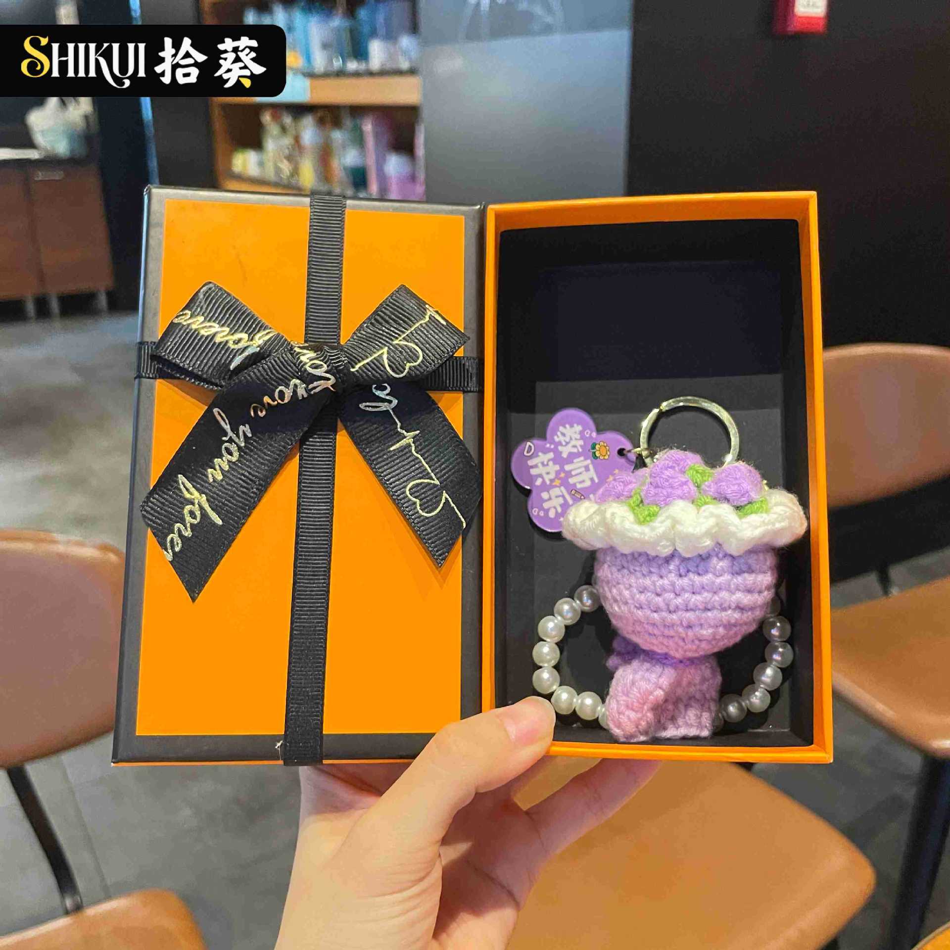 Purple chain pearl, orange gift box
