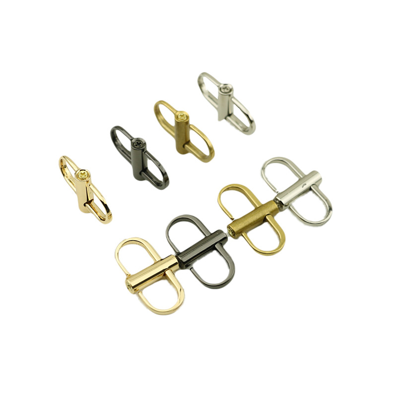 Venta al por mayor accesorios de hardware de cuero hebilla de ajuste de cadena fina de metal bolsa de posicionamiento de tornillo hebilla de ajuste de longitud de cadena