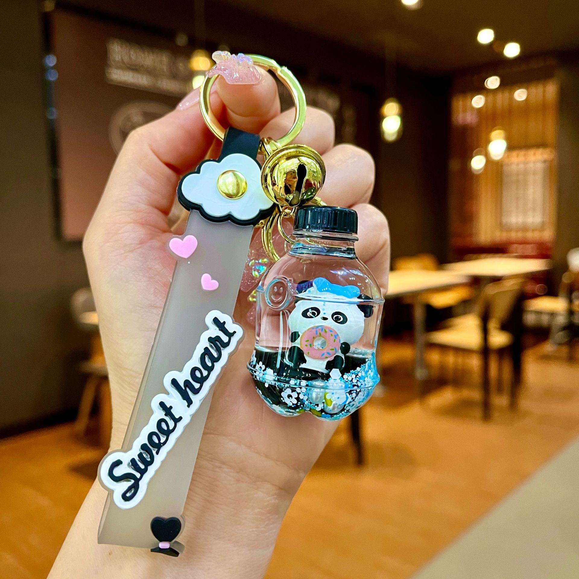 Nuevo llavero de dados luminosos con aceite, cuentas de burbujas, dados, colgantes de botella de arena de cristal, colgantes de bolsas al por mayor