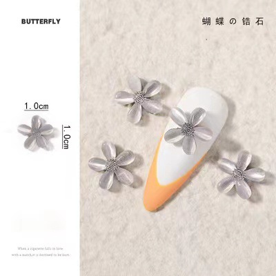 Accesorios de uñas Opal Mariposa nueva flor de lujo ligero Aleación de diamantes accesorios pegatinas de uñas decoración de diamantes de imitación al por mayor