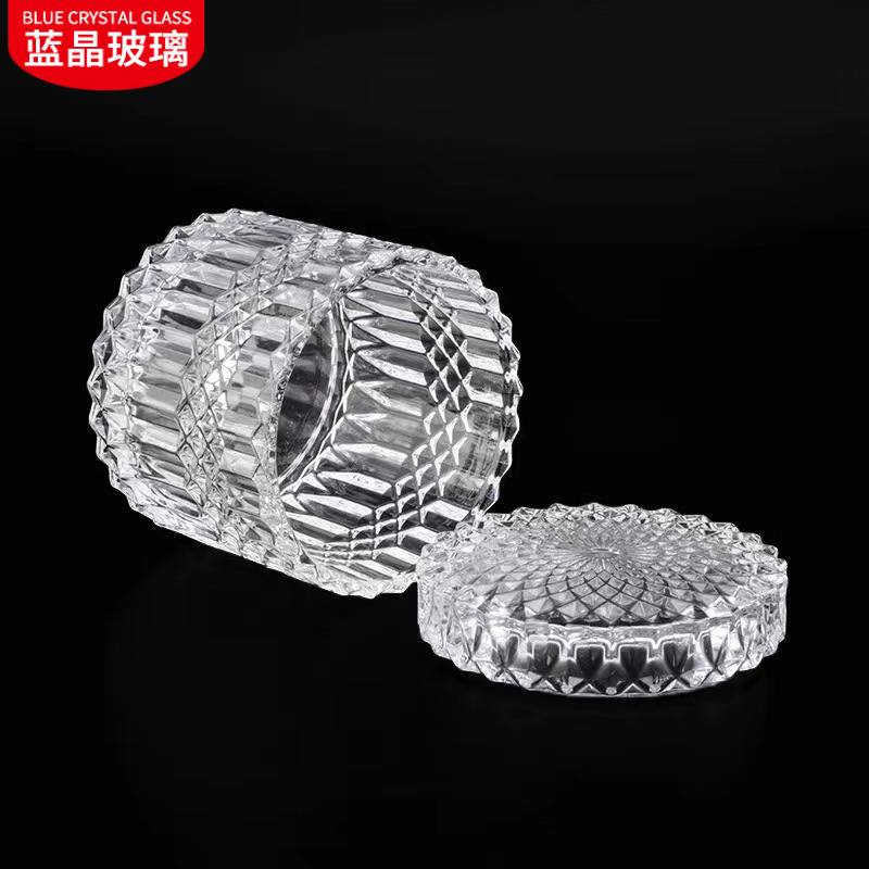 En stock suministro de embalaje independiente de vidrio transparente candelabro tarro de caramelo en relieve patrón cubierta de vidrio taza de vela