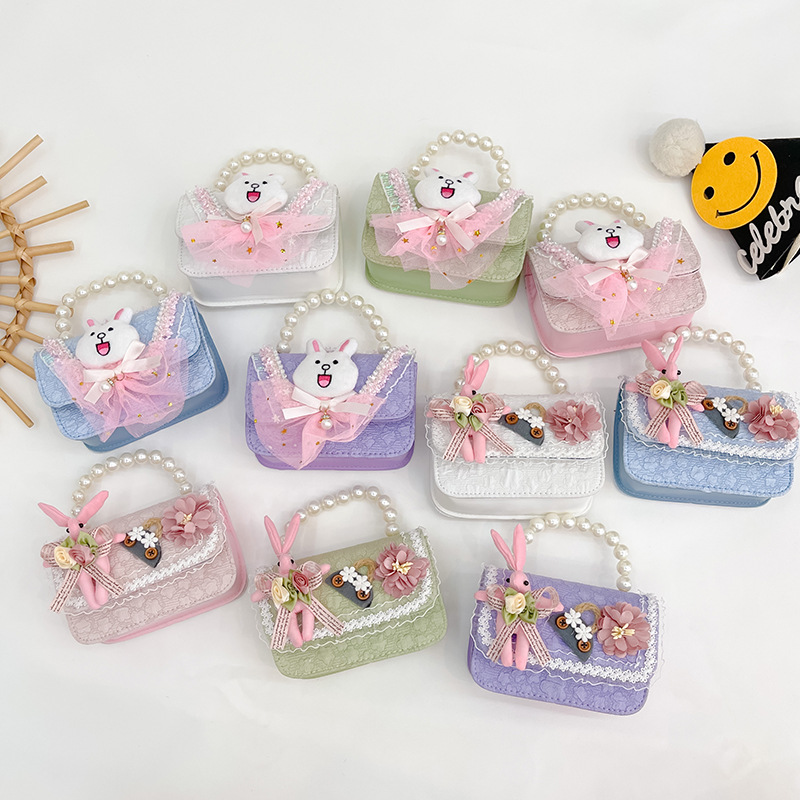 2023 nuevos niños de algodón y lino monedero niñas de viaje de compras elegante bolsa de mensajero de dibujos animados conejito bolsa de hombro