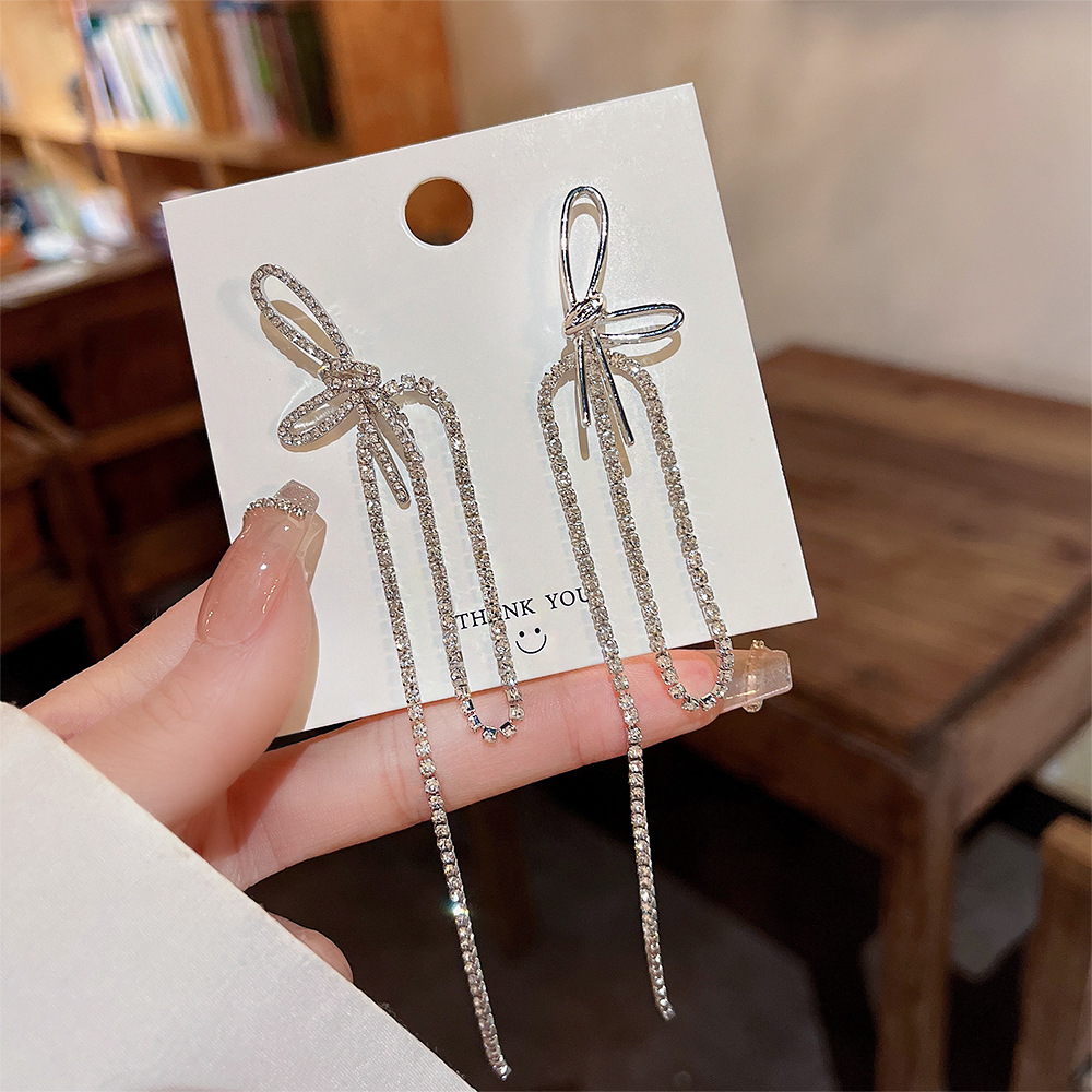 925 Silver needle A small minority design Asymmetry bow Earrings senior Ladies tassels Ear Studs