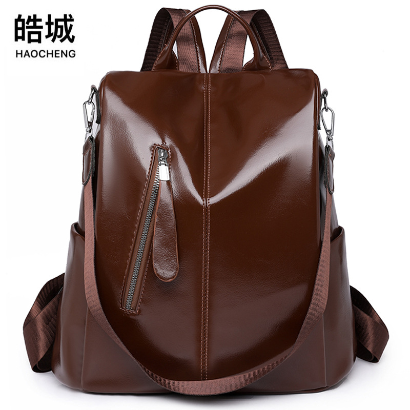 Comercio exterior al por mayor 2023 nuevas señoras mochila antirrobo simple retro cuero suave mochila de viaje mochila escolar de doble uso marea