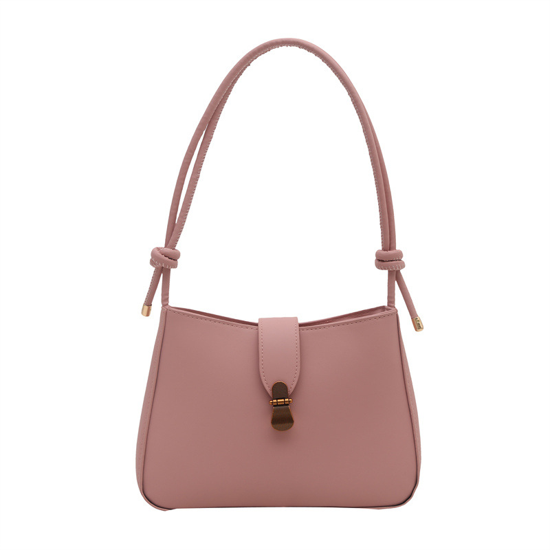 Bolsa de brazo retro para mujeres 2025 primavera nueva bolsa de moda pequeña bolsa de viaje coreana simple bolsa de hombro extranjera