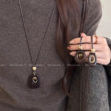 不规则镂空虎眼石吊坠项链女秋冬新款秋冬长款毛衣链小众设计配饰