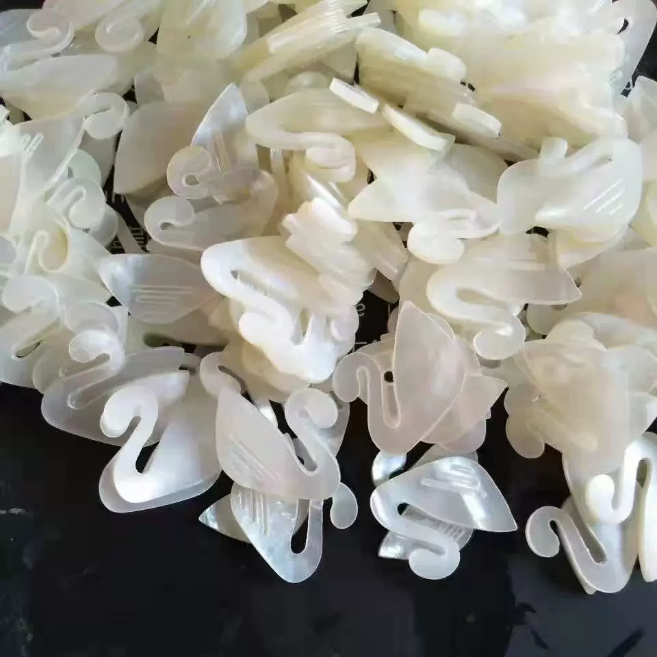 贝壳配件雕刻，款式新颖花式任选。给贝壳十分信任还你百倍清凉