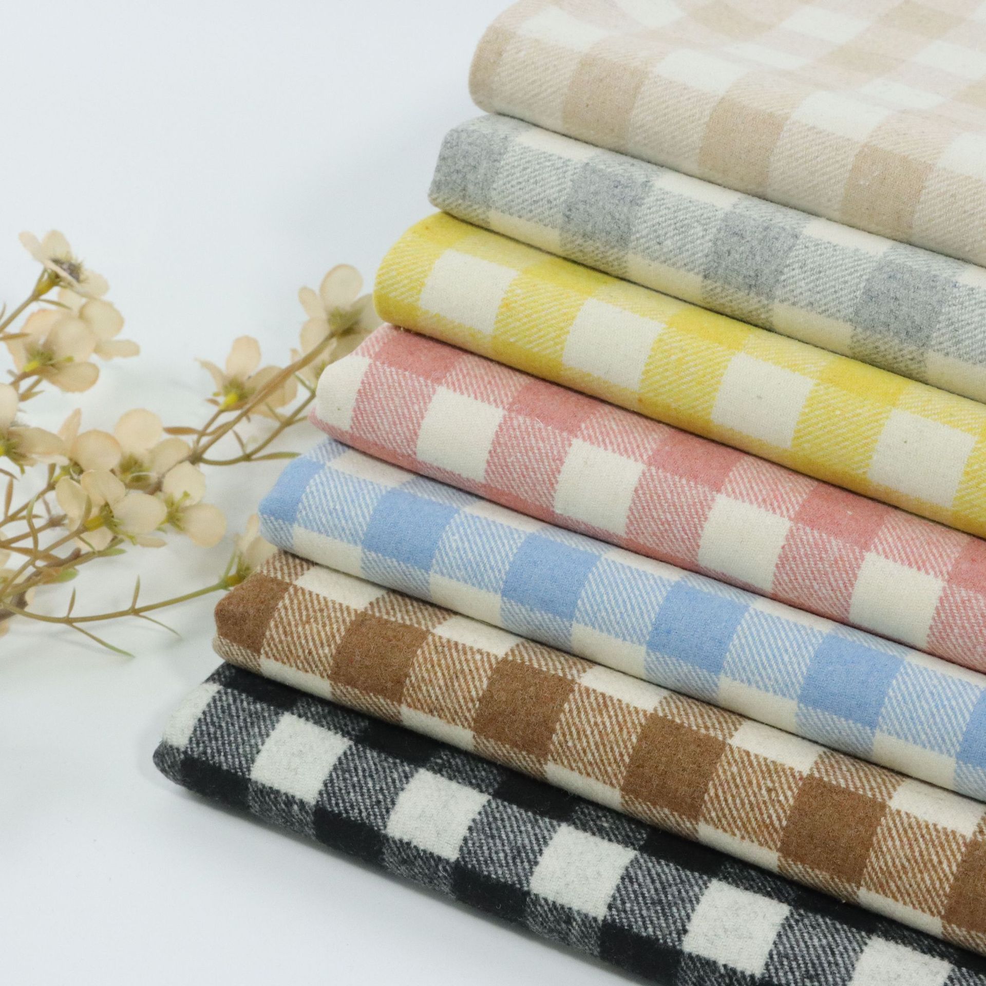 现货批发轻奢简约色织羊毛单面小方格磨毛朝阳格毛纺面料男女童装