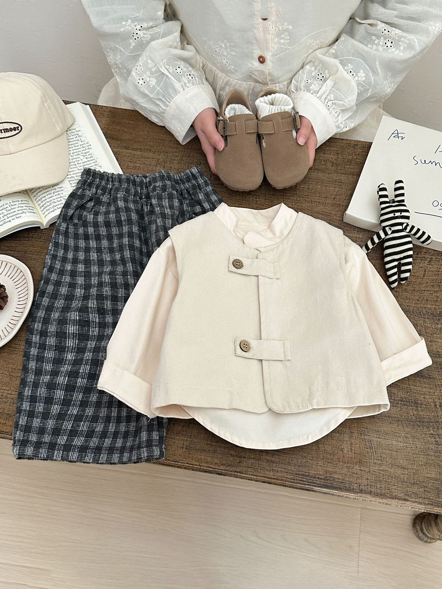 A principios de primavera ropa de bebé de algodón chaleco primavera y otoño 2026 bebé coreano plegado chaleco guapo ropa de primavera para salir