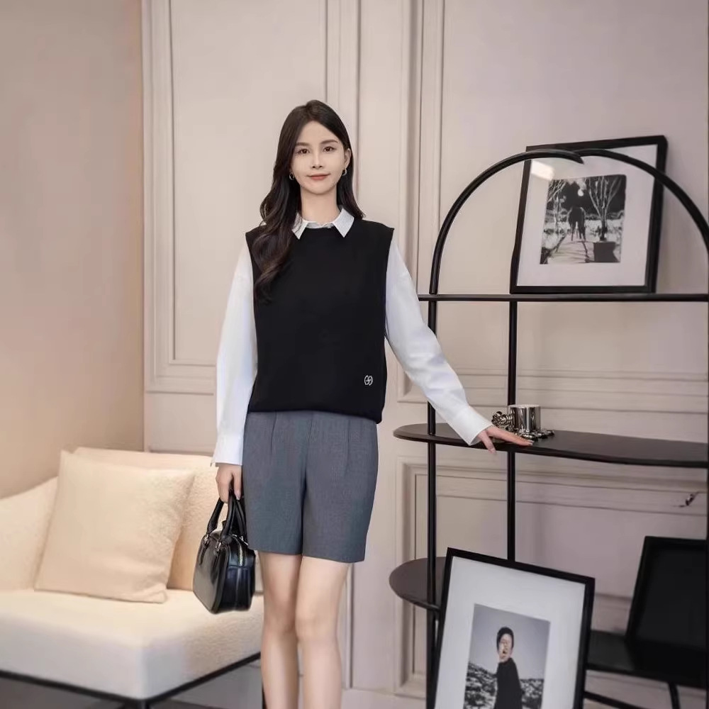 Áo len cổ lọ nữ dệt kim không tay form suông — đen