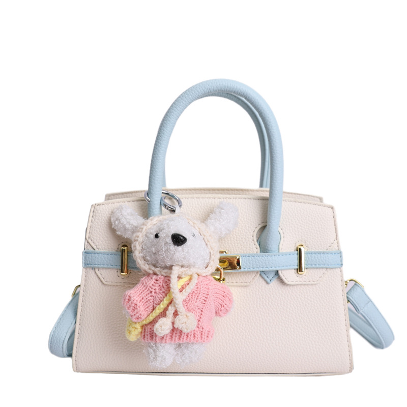 Coreano simple bolso de mano mujer 2026 primavera nueva bolsa de viaje diario texturizada bolso de mochila