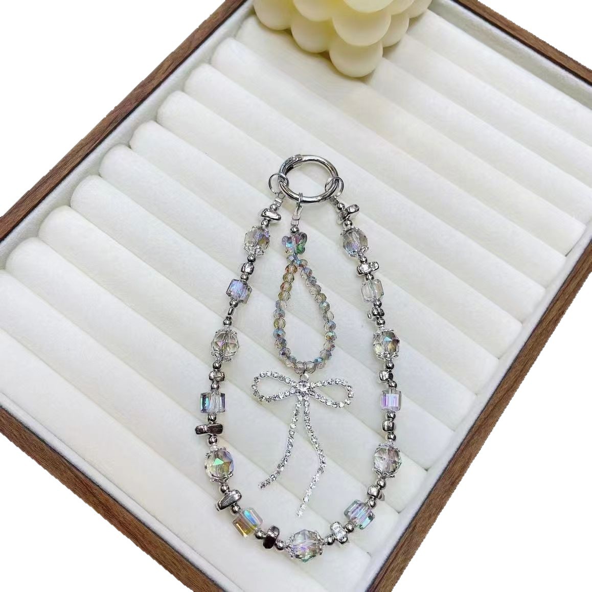 Lazo de lujo ligero, borla, cadena de teléfono móvil de cristal, cordón de muñeca, nueva cadena de nicho, exquisito colgante de alta gama