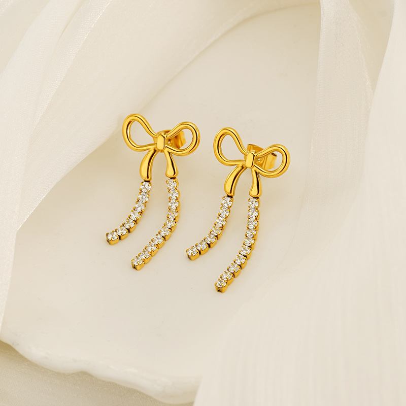 Pendientes de borla con lazo largo de acero inoxidable europeo y americano estilo INS Pendientes de diamantes de tendencia de personalidad dorada femenina al por mayor