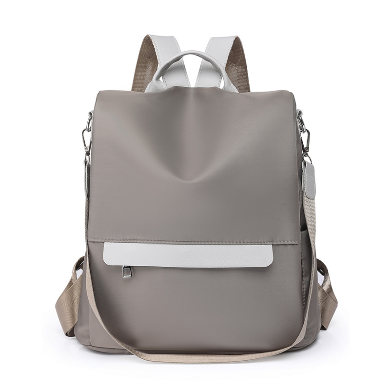 Comercio exterior al por mayor 2023 nueva mochila antirrobo de nailon para mujer casual moda contraste color mochila de viaje de doble uso marea