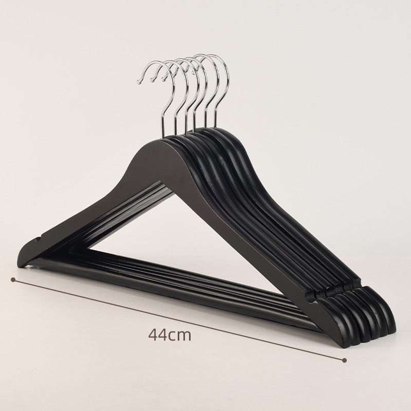 黒と白の実木滑り止めハンガー服装店ホテルのシンプルなハンガーの木製服の現物彫刻卸売り