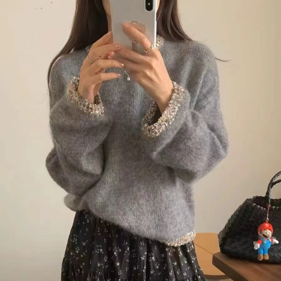 Autumn knitted sweater with a round collar
