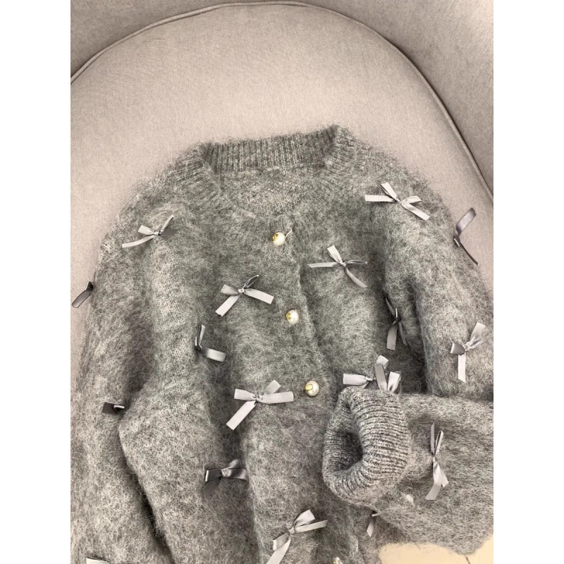 Design demi-season sweater with bow